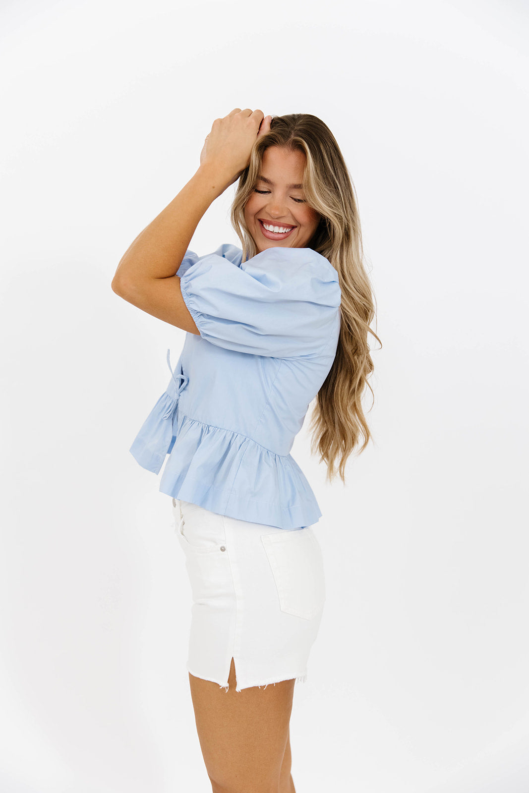 Mabel Knot Detail Peplum Top in Blue