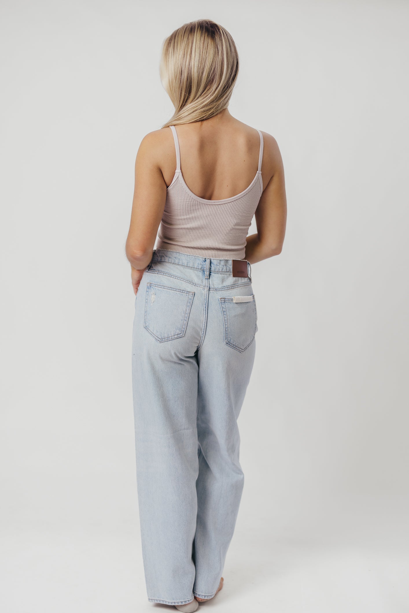 Nori Lightly Distressed Stretch Denim in Light Wash