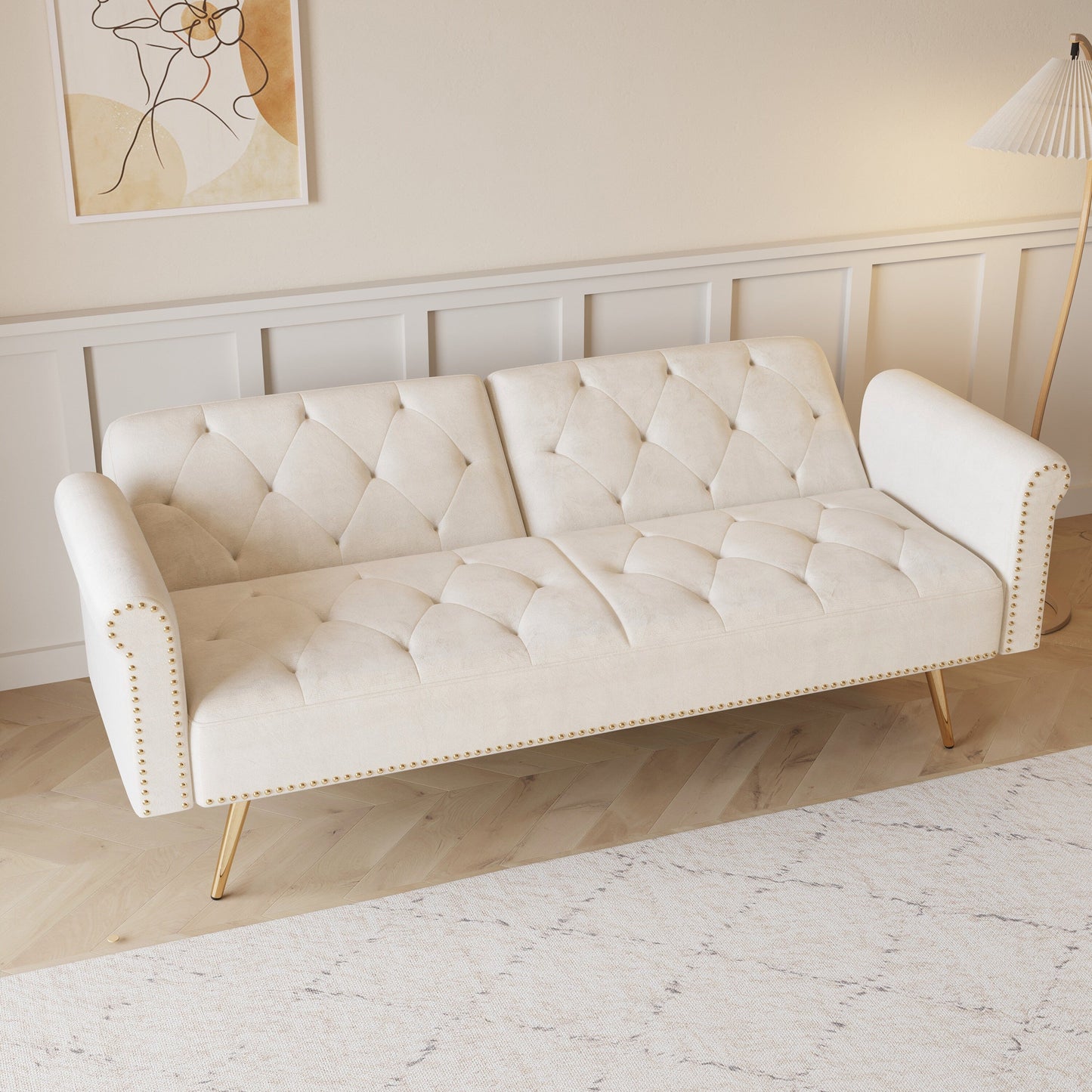 A 69.7-Inch-Long Sofa Bed Covered In Velvet Fabric, Featuring Nail Head Trim And Accompanied By A Matching Throw Pillow