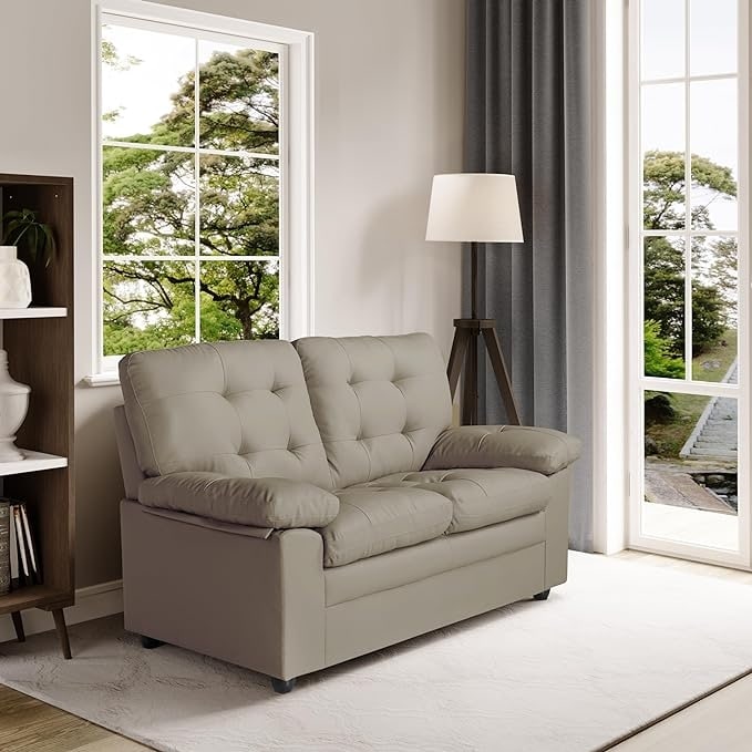 Plush Upholstered Loveseat with Faux Leather, Tufted Back, and Padded Arms - Cozy Seating for Living Room or Family Room.
