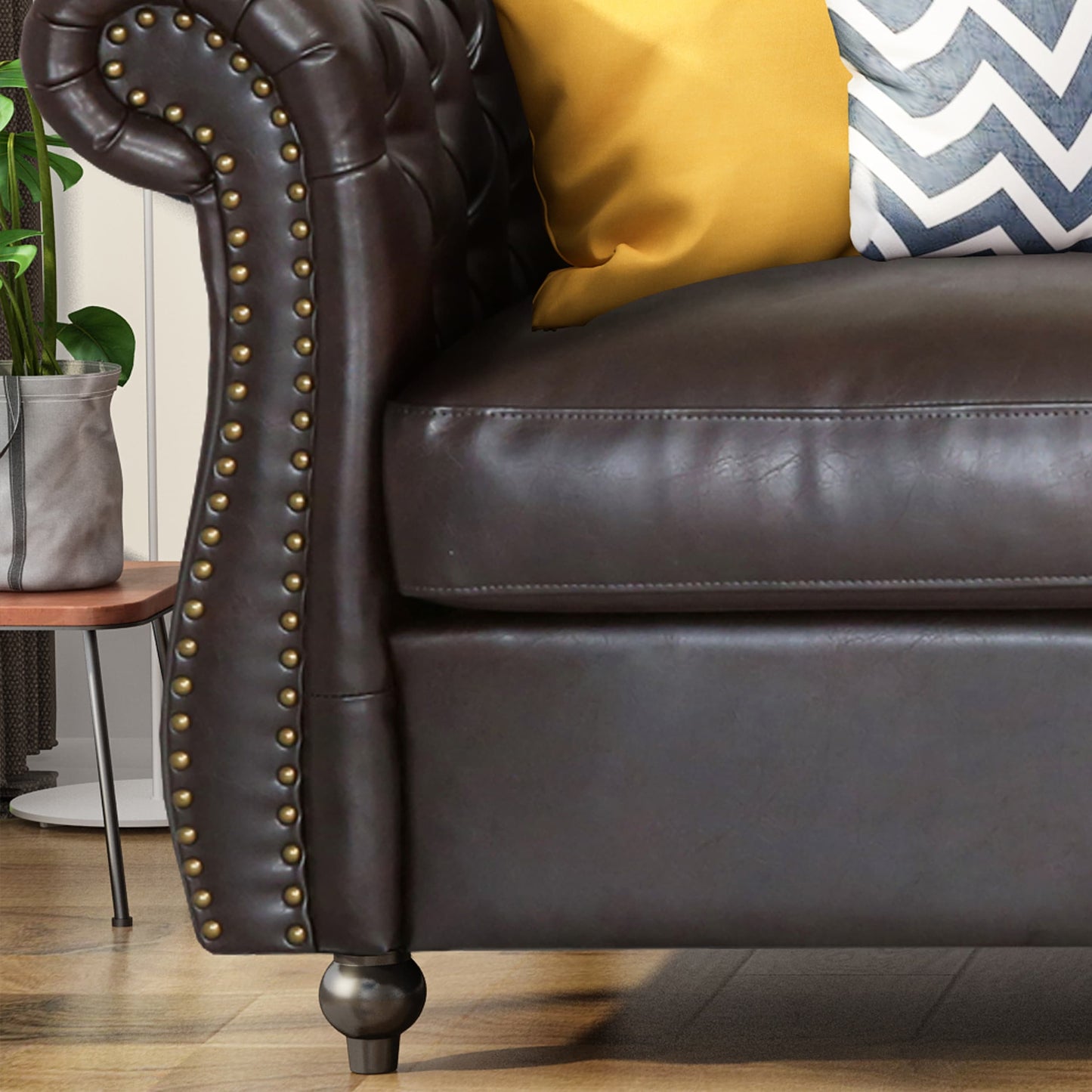 Somerville Chesterfield Tufted Faux Leather Sofa with Scroll Arms by Christopher Knight Home