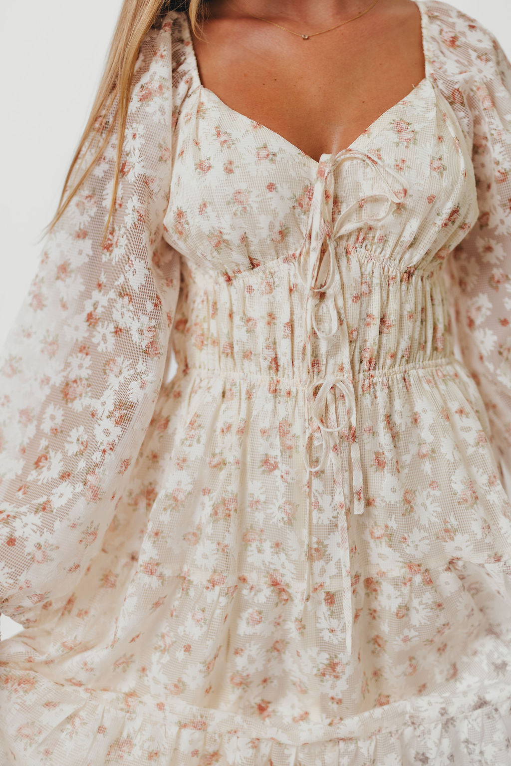 Macklynn V-Neck Long Sleeve Tier Maxi Dress in Cream/Orange Floral