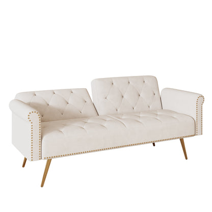 A 69.7-inch-long sofa bed covered in beige velvet fabric, featuring nail head trim and accompanied by a matching throw pillow