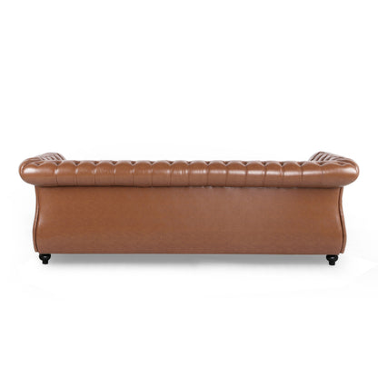 Somerville Chesterfield Tufted Faux Leather Sofa with Scroll Arms by Christopher Knight Home