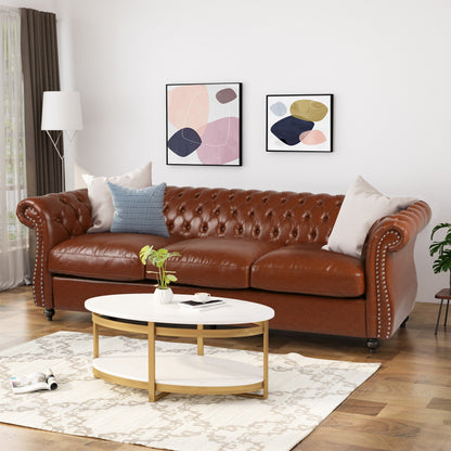 Somerville Chesterfield Tufted Faux Leather Sofa with Scroll Arms by Christopher Knight Home